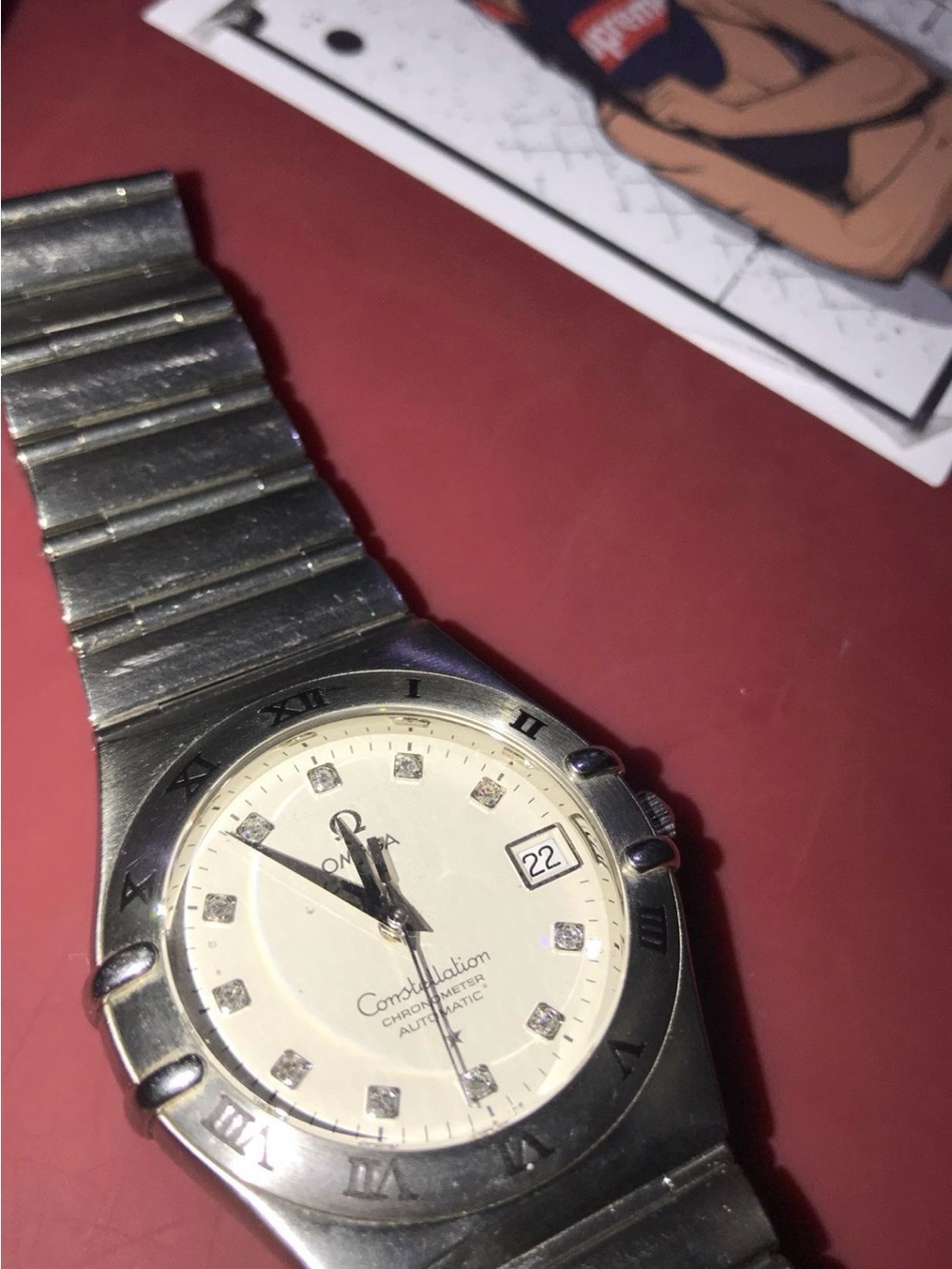Omega Men’s Silver Watch with White Dial and Diamond Markers